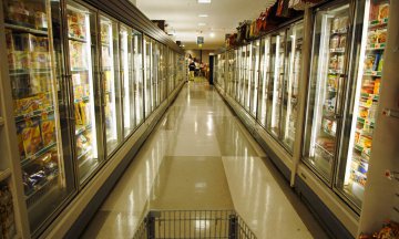 Frozen food aisle in grocery store
