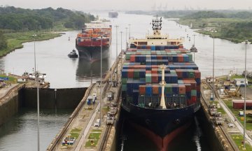 Cargo ship in the Panama Canal at Gatun Locks on the Atlantic side, heading west towards the Pacific