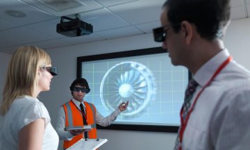 Scientists wearing 3D glasses in lab