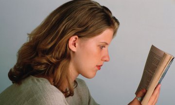 Teenage Girl Reading a Book