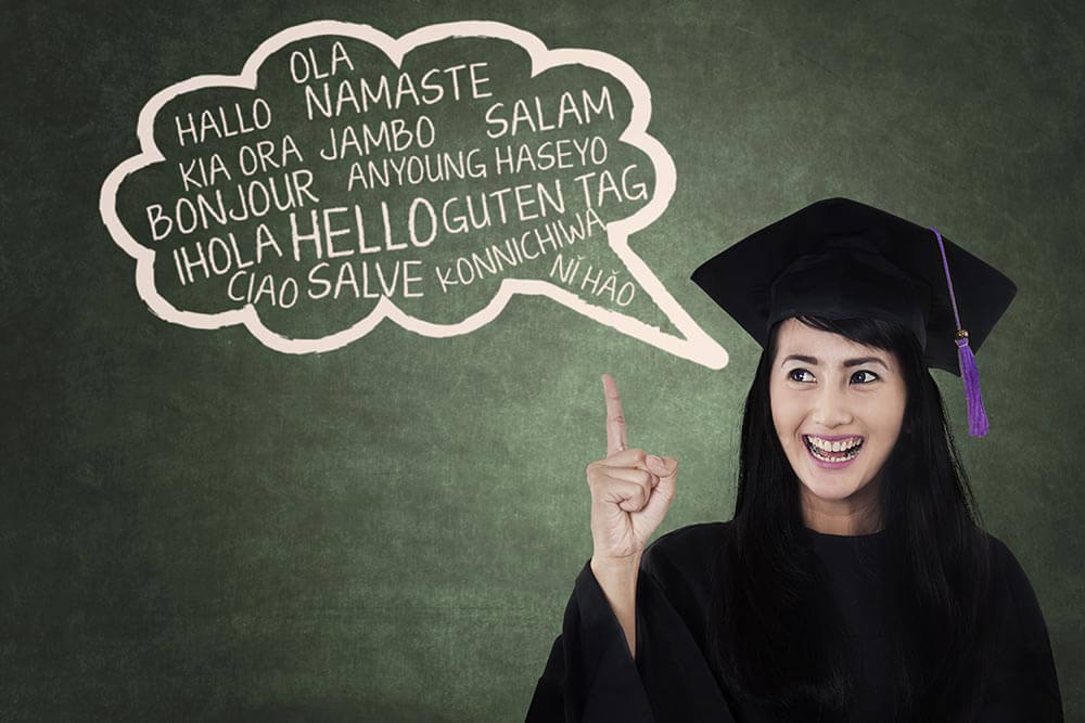 Female graduate with speech bubble hello in multiple languages