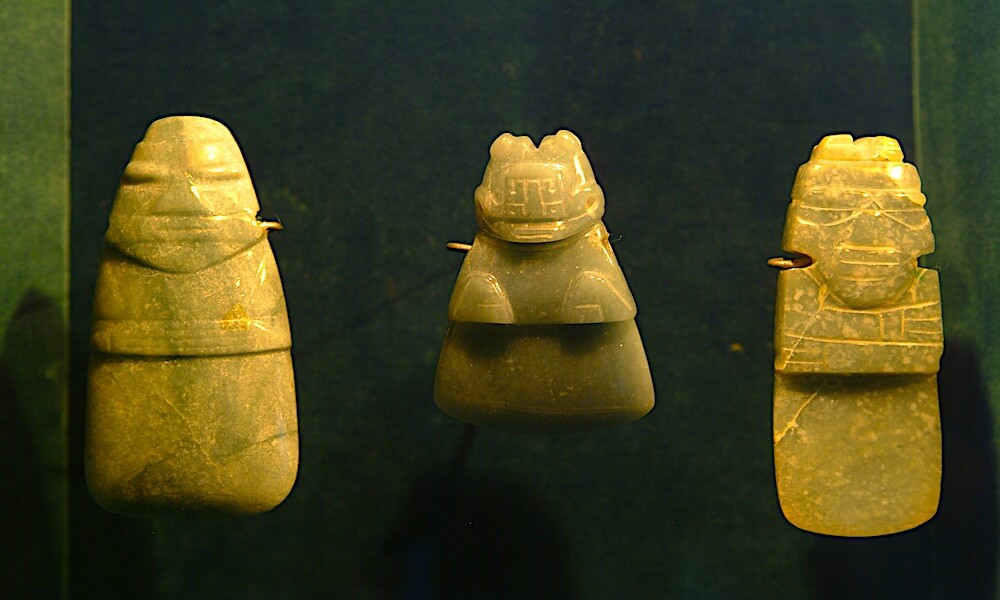 Three jade pieces in a museum display show the artistic ability of indigenous groups in Costa Rica