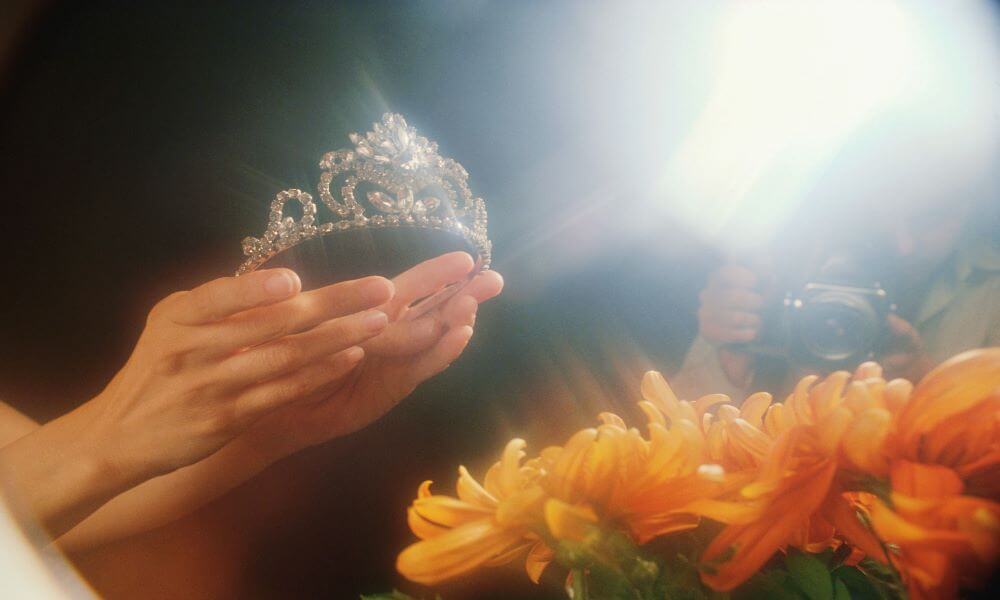 Beauty Pageant Winner Holding Crown