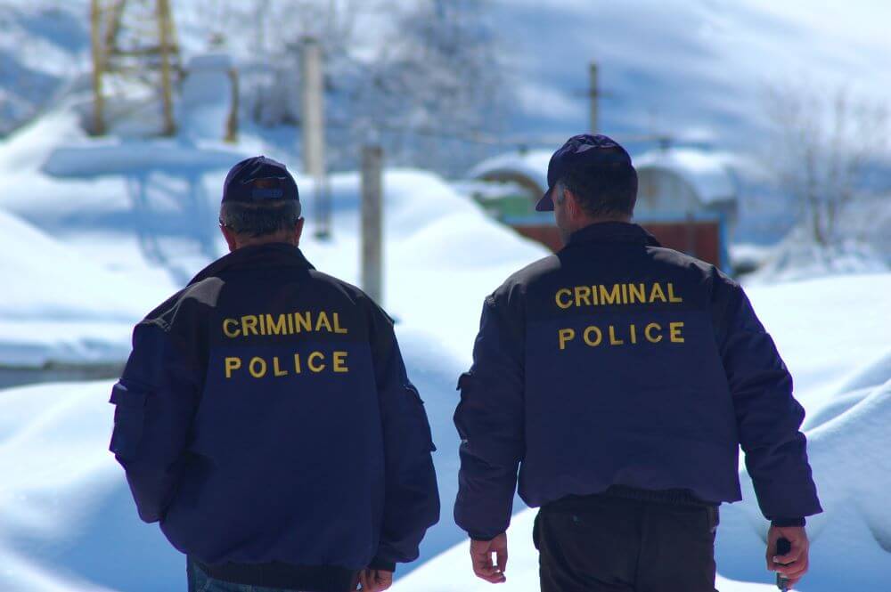 Criminal Police patrolling in winter