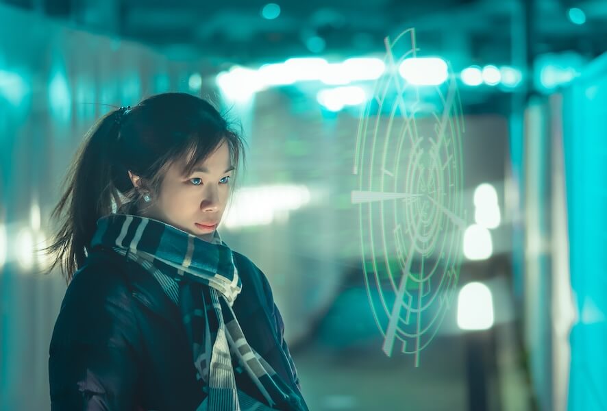 Woman looking at futuristic hologram display from her eye